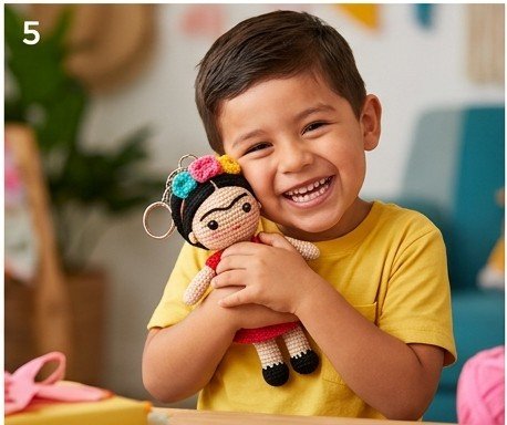 Smiling boy hugging handmade Frida doll keychain
